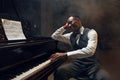 Black grand piano player, jazz performer Royalty Free Stock Photo