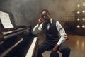 Black grand piano player, jazz performer Royalty Free Stock Photo