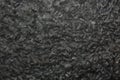 Black granite surface, background, wallpaper. Royalty Free Stock Photo