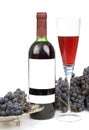 Black grape and bottleful wine Royalty Free Stock Photo