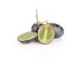 Fresh raw black grape isolated on white