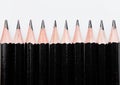 Black graphite pencils on white background