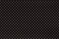 Black gray fishnet cloth material as a texture background. Royalty Free Stock Photo