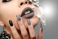 Black gray glam matte makeup and manicure Royalty Free Stock Photo