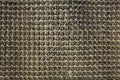 Black gray plastic pile tentacles in rows close-up. rough surface texture Royalty Free Stock Photo