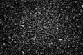 Black gray small crushed stones background texture