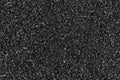 Black gray small crushed stones background texture