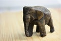 Wooden female elephant on wooden table. Royalty Free Stock Photo