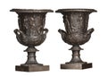 Black greek style urns with Roman style figures