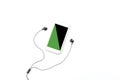 Black and green color on smart phone screen and earphones