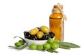 Black and green olives mixed in the porcelain bowl and Virgin olive oil Royalty Free Stock Photo