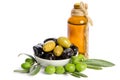 Black and green olives mixed in the porcelain bowl and Virgin olive oil Royalty Free Stock Photo