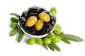 Black and green olives mixed in the porcelain bowl Royalty Free Stock Photo