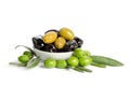 Black and green olives mixed in the porcelain bowl Royalty Free Stock Photo