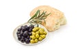 Black and green olives, olive branch and ciabatta Royalty Free Stock Photo