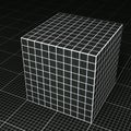 Black grid paper cube on black grid paper floor