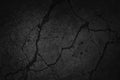 Black grunge background. Texture of cracked concrete wall. Close-up. Royalty Free Stock Photo