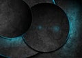 Black grunge tech circles with blue neon lights abstract background Royalty Free Stock Photo