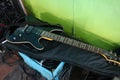 Black guitar instrument, rock music style Placed on the stage waiting to be shown