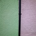 Black Guttering pipe fixed to an external wall