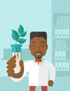 Black guy Chemist with tube and eco leaves