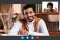 Black guy having video conference with indian man teacher Royalty Free Stock Photo