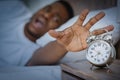 Black Guy Turning Off Alarm-Clock Screaming Lying In Bed Indoor