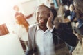 A black guy works as a call center operator. Royalty Free Stock Photo