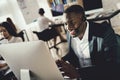 A black guy works in a call center. Royalty Free Stock Photo