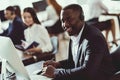 A black guy works in a call center. Royalty Free Stock Photo