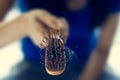 Black hair loss problem with hairbrush