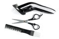 Black hair scissors, comb and hair clipper isolated on white background Royalty Free Stock Photo