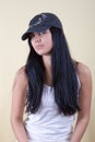 Black hair young woman in cap