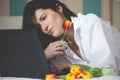 Black haired young woman in her bed in the morning Royalty Free Stock Photo