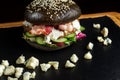 Black hamburger made from beef, with dor-blu-3