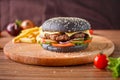 Black Hamburger with meat cutlet