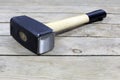 Black Hammer With Wooden Handle On Wooden Background Royalty Free Stock Photo