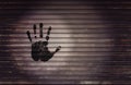 Black Hand print on wall background Royalty Free Stock Photo