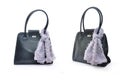 Black handbag with violet silk scarf Royalty Free Stock Photo