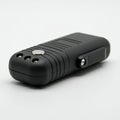 A black handheld device featuring a textured grip and four circular holes at one end. The