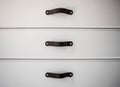 Black handles of the kitchen drawer or cabinet