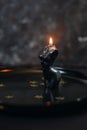 black handmade wax candle in the form of a female body