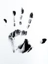 A black handprint on a white background Royalty Free Stock Photo