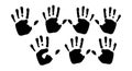 Black handprints arranged in two rows vector illustration for creative design or background use Royalty Free Stock Photo