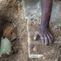 Black hands digging in the soil Royalty Free Stock Photo