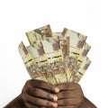 hands holding 3D rendered 1000 Kenyan shilling notes. closeup of Hands holding Kenyan currency notes Royalty Free Stock Photo