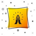 Black Hands in praying position icon isolated on white background. Prayer to god with faith and hope. Yellow square