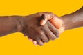 Black handshake - gold background