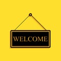 Black Hanging sign with text Welcome icon isolated on yellow background. Business theme for cafe or restaurant. Long