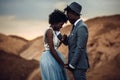 Newlyweds hold hands, laugh and stand against beautiful landscape. Royalty Free Stock Photo